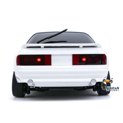 TOUCAN RC HOBBY LDRC LD1802 1/18 4x2 RX7 Voiture de course RC RWD avec gyroscope, contrôle sans fil, véhicule de drift, berline de simulation, modèle à monter soi-même