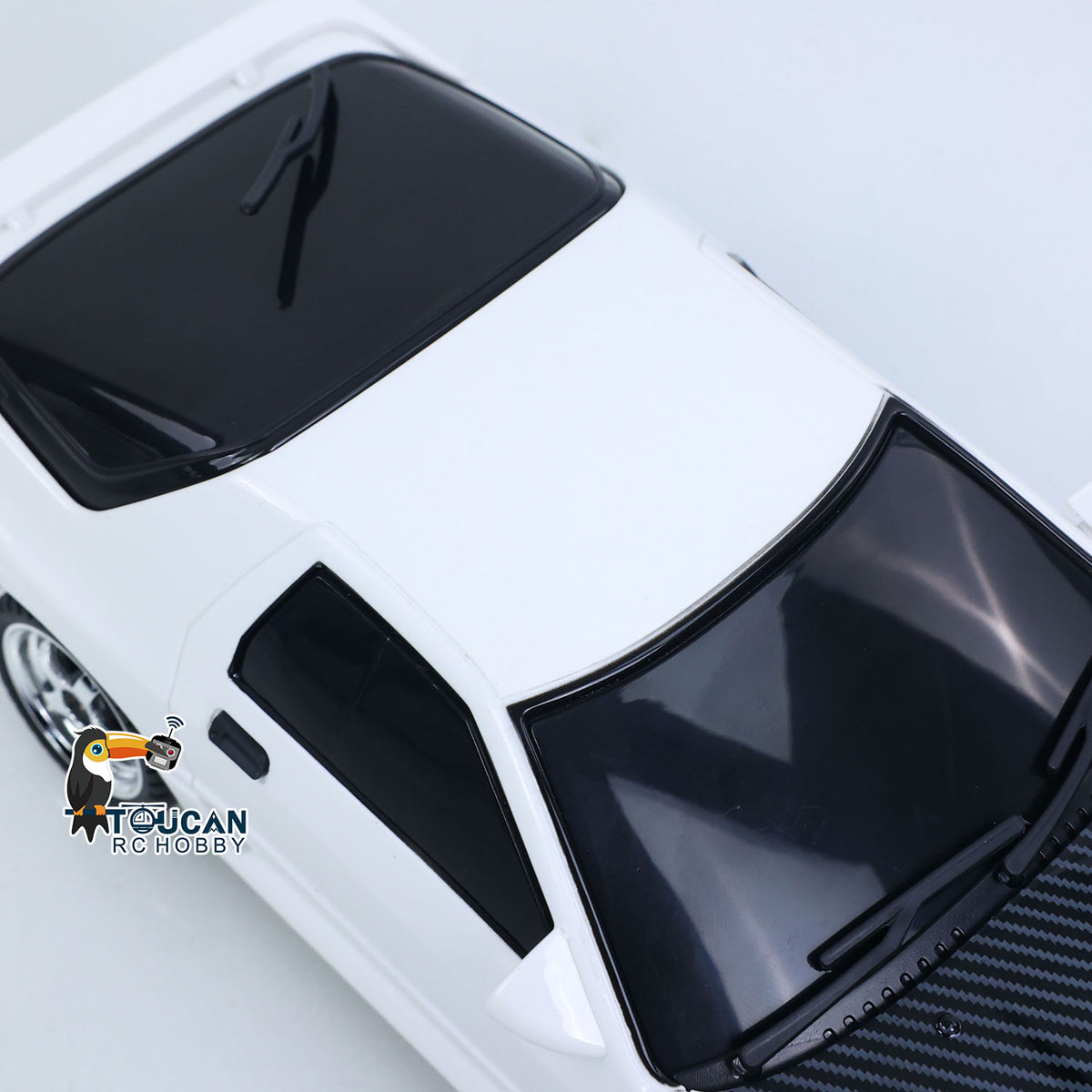 TOUCAN RC HOBBY LDRC LD1802 1/18 4x2 RX7 Voiture de course RC RWD avec gyroscope, contrôle sans fil, véhicule de drift, berline de simulation, modèle à monter soi-même